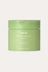 Product packaging of the best toner pad for sensitive acne prone skin with tweezers on a clean background.
